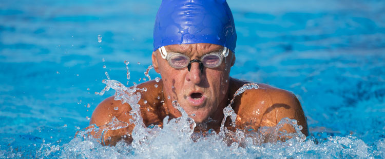 A senior man swims at a retirement community in Athens, GA