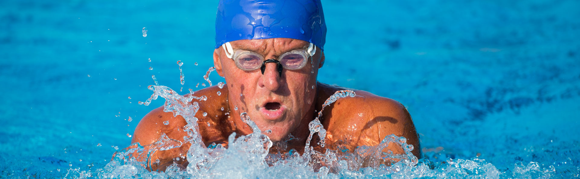 Older man swimming | Presbyterian Village Athens