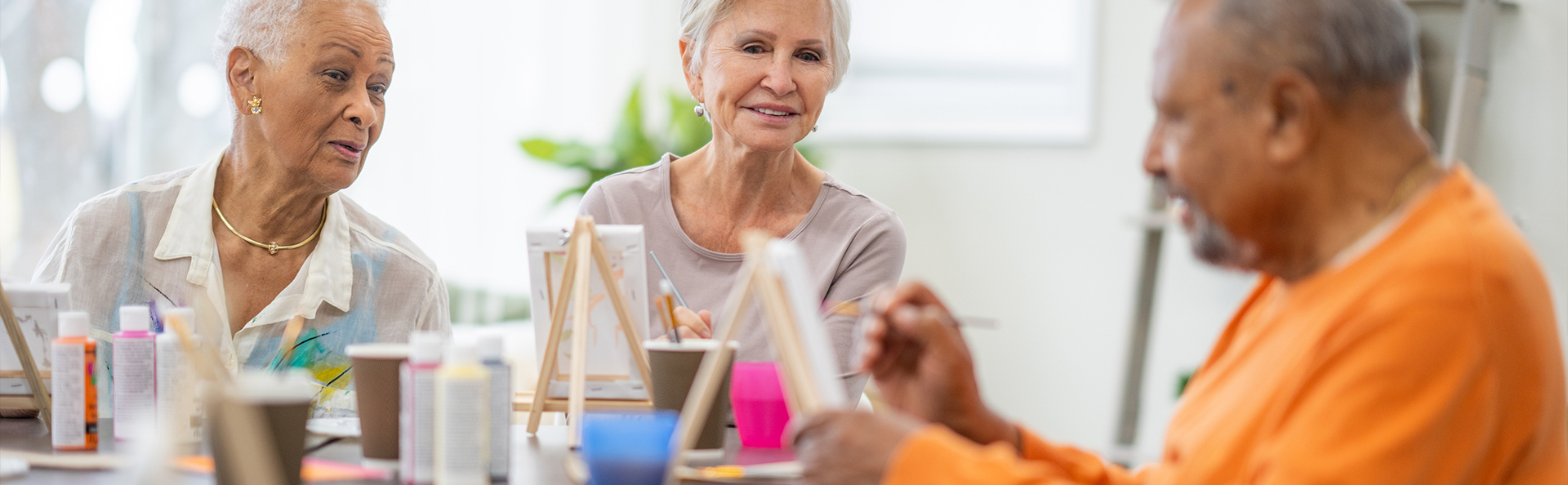 Seniors enjoy painting and doing crafts.